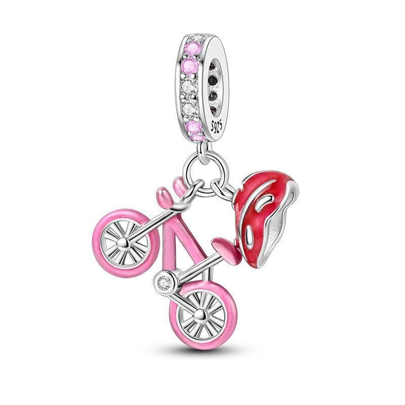 Cycolinks Pink Bicycle & Red Helmet Charm in 925 sterling silver with pink enamel bicycle and red helmet detail
