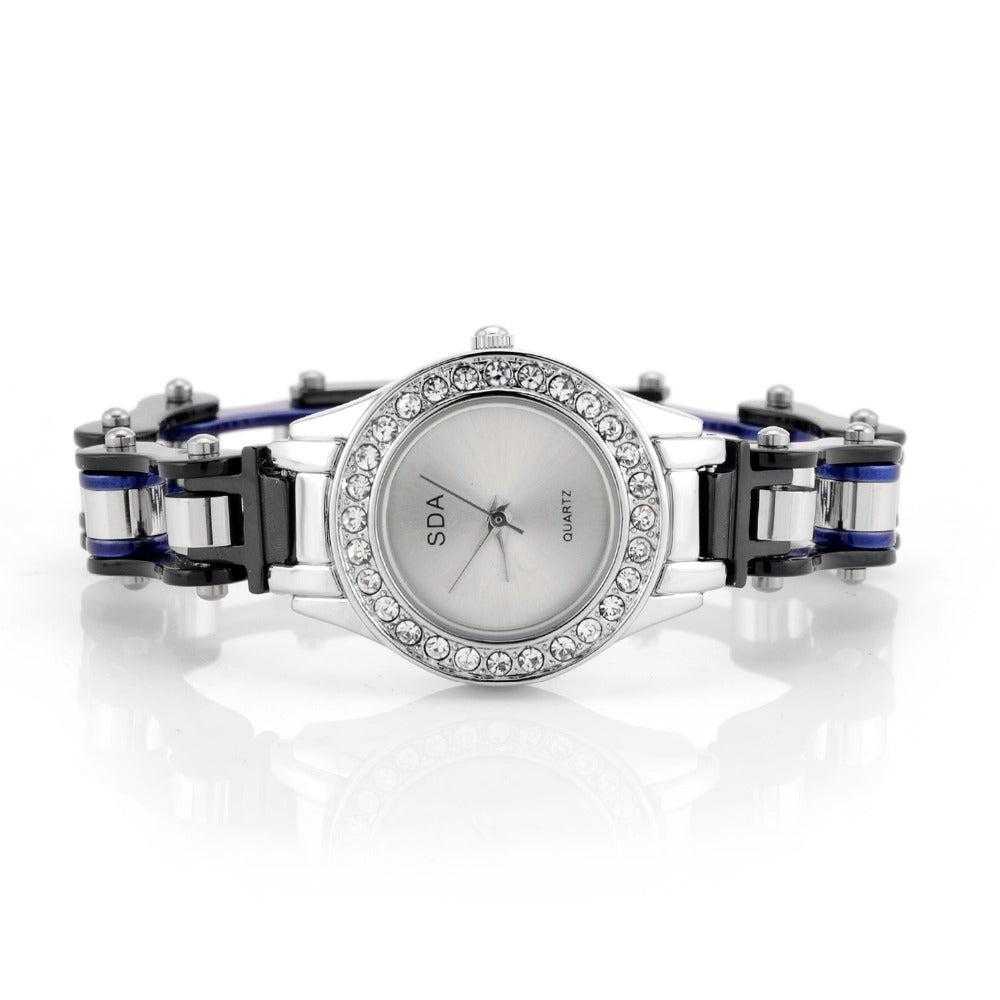Bike-chain quartz watch with crystal-set face and blue-black chain links